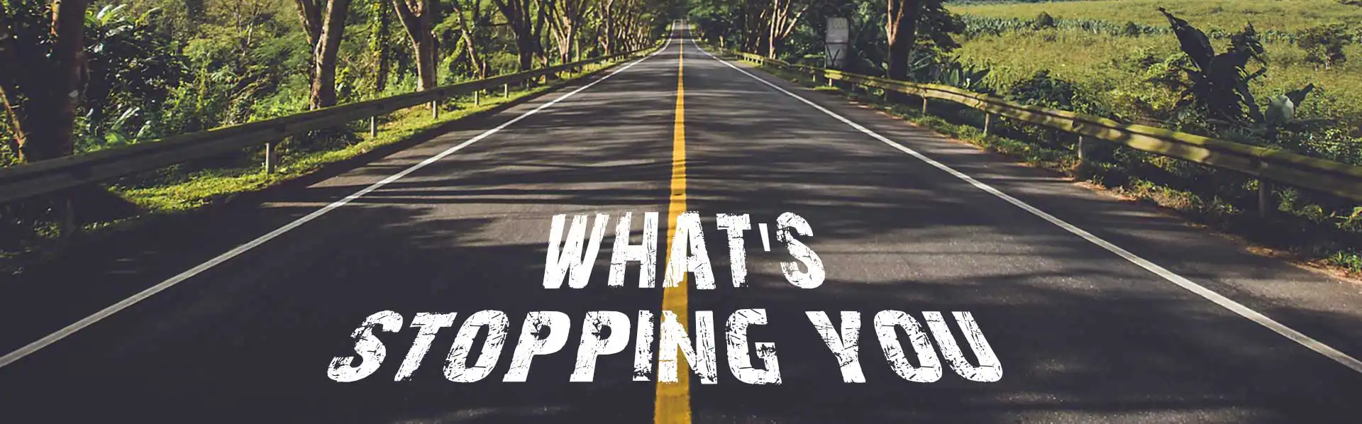 Country road with What's Stopping You